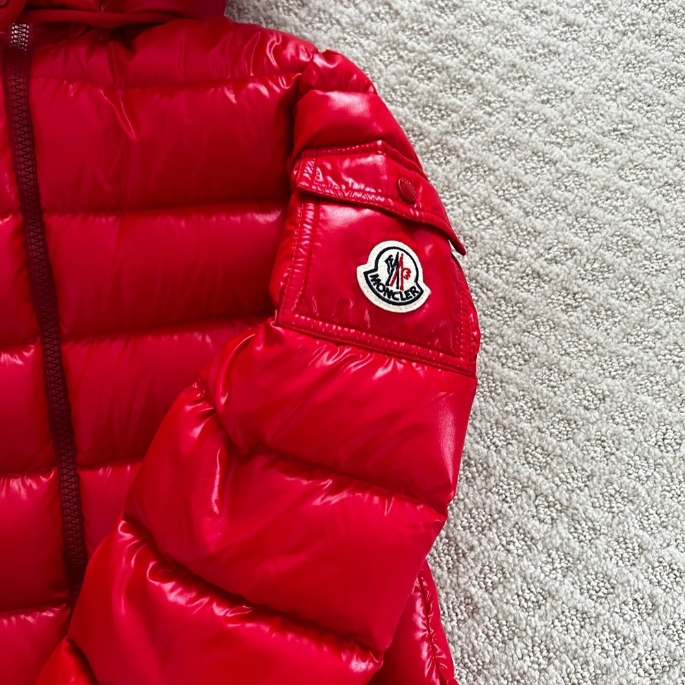 Girl’s Moncler puffer jacket with faux fur.Almost new only worn couple of times.